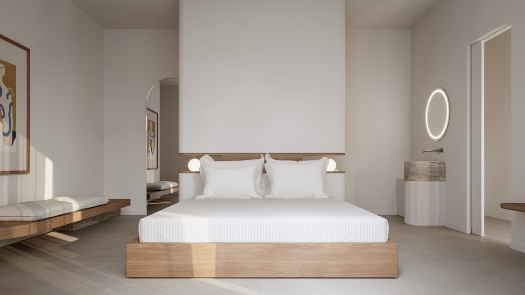 Minimalist bedroom in pale wood and chalk.
